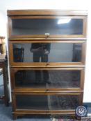A Wilton mahogany four-tier stacking bookcase CONDITION REPORT: 135cm high by 88cm