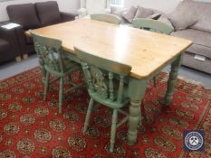 A pine farmhouse kitchen table on painted base plus four painted pine chairs