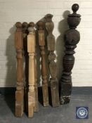 Seven wooden newel posts