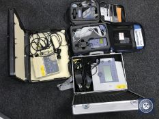 Four cased medical instruments to include a Enraf Nonius control unit with accessories,