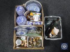 Three boxes of Ringtons china, Wade whimsies, pig ornaments, blue and white ware,