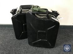 Two 20 litre Black Steel jerry cans with one filling nozzle