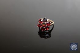A 9ct gold garnet cluster ring, size P CONDITION REPORT: 4.