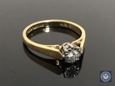 An 18ct gold diamond solitaire ring, size O CONDITION REPORT: 3.