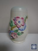 A Clarice Cliff Newport Pottery ribbed floral vase, height 15.