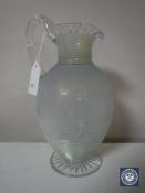 A Victorian etched opaque glass jug,