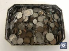 A tin containing a large quantity of pre-decimal British coinage,