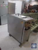 A stainless steel commercial Falcon slimline gas fryer