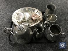 A tray of three piece plated service, two tankards, plated bowl, hip flasks etc,