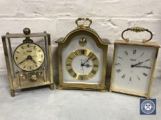Two brass cased battery operated clocks by Ojival and Swiza,
