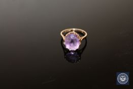 A 9ct gold amethyst solitaire ring, size M CONDITION REPORT: 3.