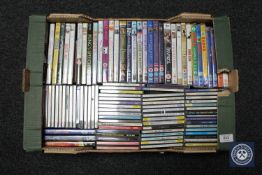 A collection of compact discs and DVD's.