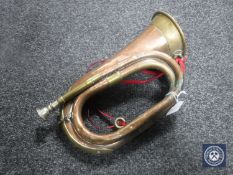 A brass and copper bugle