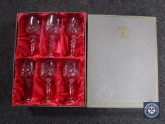 A boxed set of six Bohemian crystal wine glasses