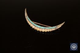A late Victorian turquoise and seed pearl crescent brooch