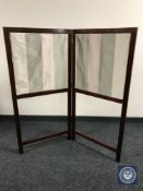 An Edwardian mahogany fire screen and a folding child's chair