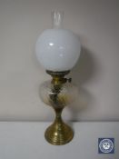 A Victorian brass Duplex oil lamp with chimney and shade,