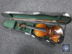 A 20th century 1/2 size violin and bow in hard case