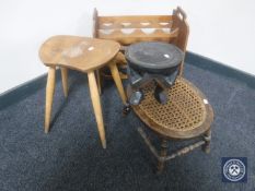 An Ercol stool, an African stool,