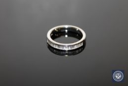 An 18ct white gold diamond half-eternity ring,