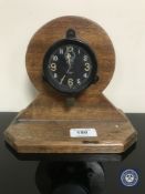 A Zenith eight day timepiece on oak stand