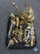 A tray of assorted brass ware, kettle on trivet, miniature cannons, figure of coal miner,