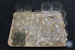 Twenty-four miscellaneous drinking glasses.