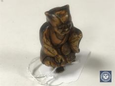 A hardwood netsuke - Village Elder.