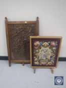 An early 20th century heavily carved fire screen,