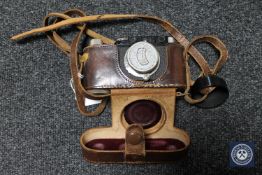 A 1932 Leica camera in leather case