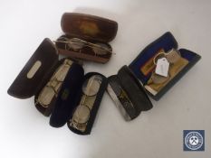 A box of five pairs of cased vintage spectacles