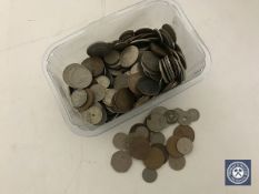 A tub containing a large quantity of pre-decimal British coinage,