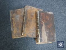 Three antique leather bound volumes,