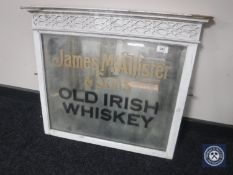 A 20th century framed mirror bearing "James McAllister & Sons Old Irish Whiskey"