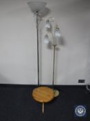 Two contemporary floor lamps together with a circular low occasional table and a box containing