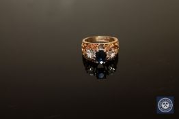 A 9ct gold diamond and synthetic sapphire ring, size M CONDITION REPORT: 4.