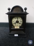 A late 19th century gilded ebonised bracket clock with brass and enamelled dial