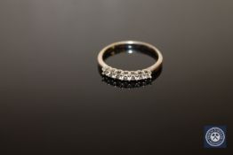 An 18ct white gold diamond half eternity ring, stated total diamond weight 0.35 carat, size T/U.