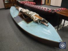 A rare early 20'th Century canvas-decked wooden sailing canoe, with sailing rig,