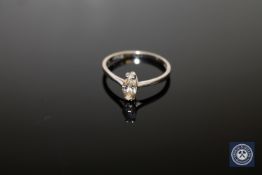 An 18ct white gold diamond solitaire ring,