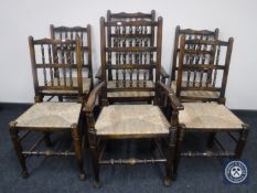 A set of six rush seated country kitchen chairs