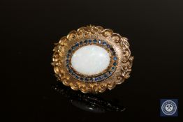 A 9ct gold opal and sapphire set brooch