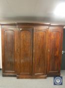 A Victorian mahogany breakfront four-door wardrobe,