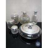 Four glass sterling silver lidded jars,