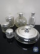 Four glass sterling silver lidded jars,