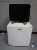 A Coolzone bench top fridge and an electric heater