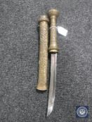A Persian brass handled knife in sheath