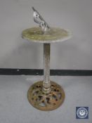 A cast metal sun dial