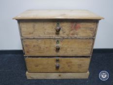 A Victorian pine three drawer chest