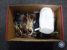 A box of costume jewellery and a small quantity of silver jewellery